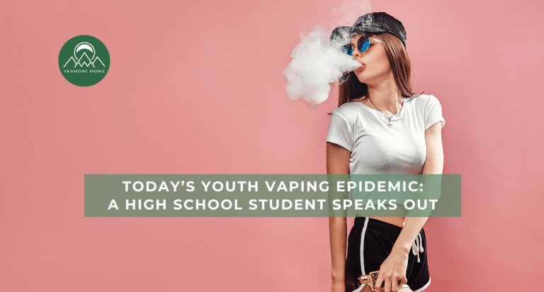 Teen girl vaping and blowing a big cloud of vapor