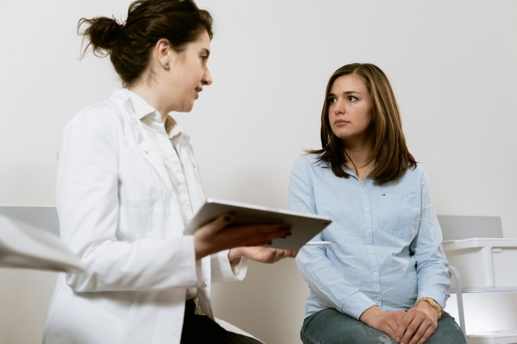 woman speaking to her doctor